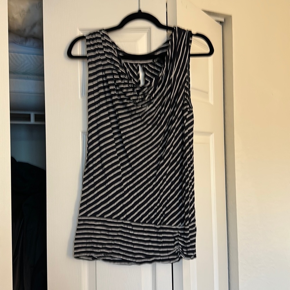 Black and white stripped work tank. Express medium.